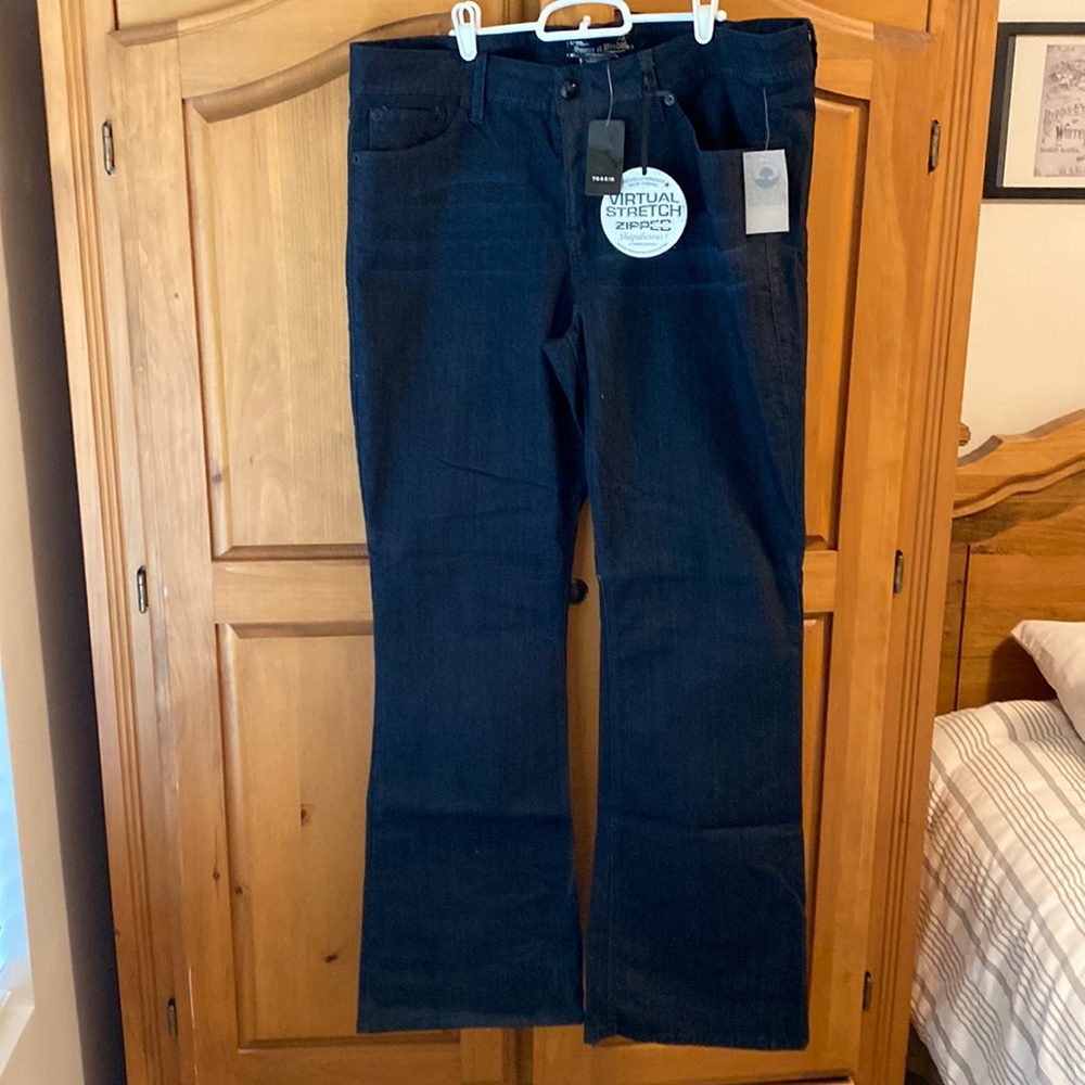 NWT Source of Wisdom boot leg jeans from Torrid 20